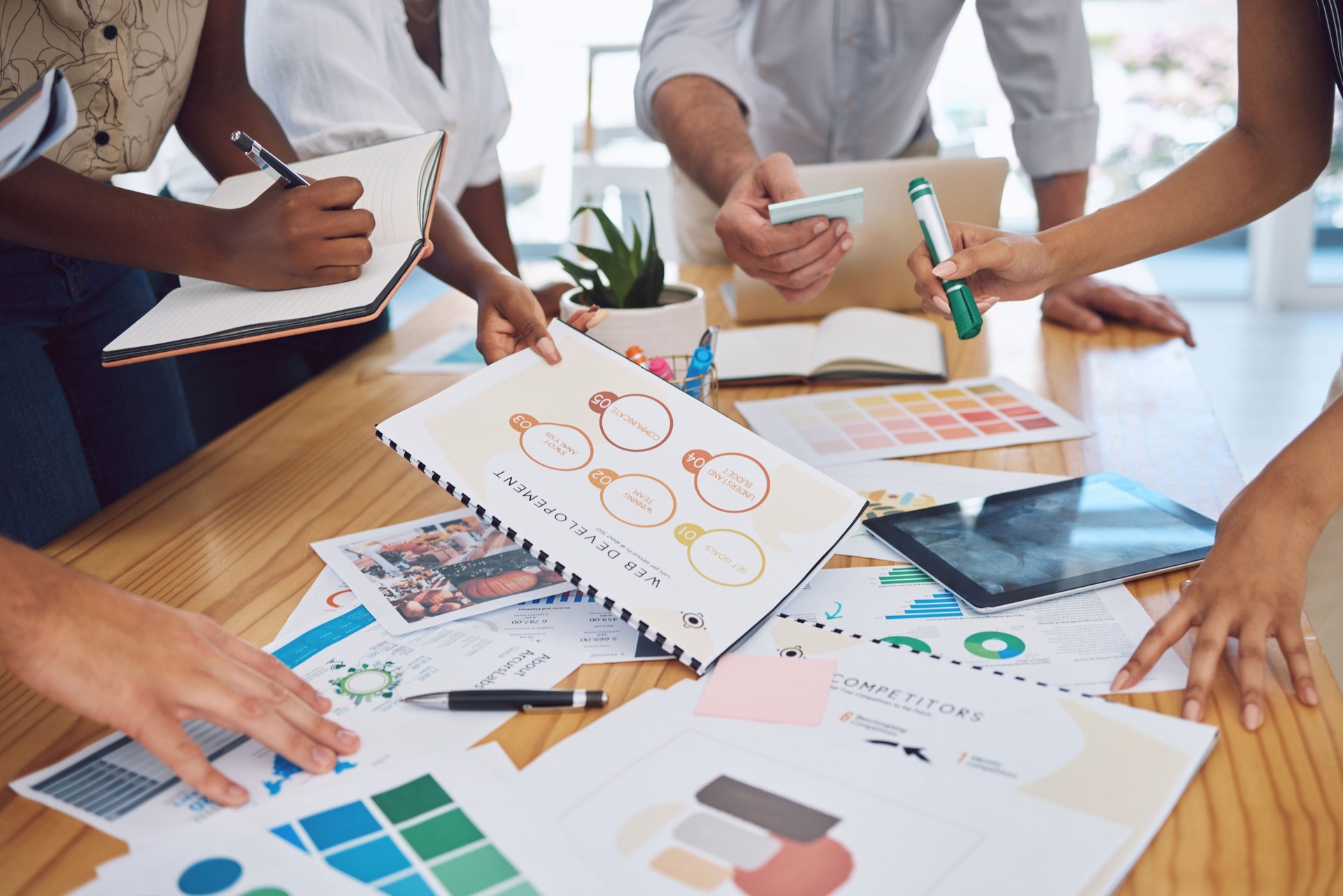 Finance business people planning with documents in meeting, talking with financial paperwork in workshop and writing data and stats in book with team. Accountant workers in accounting collaboration